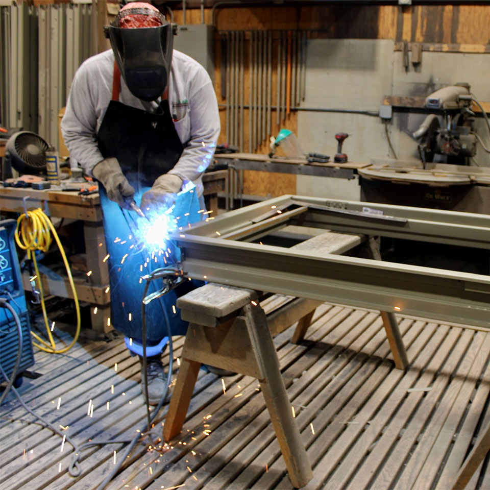 worker doing custom metal work