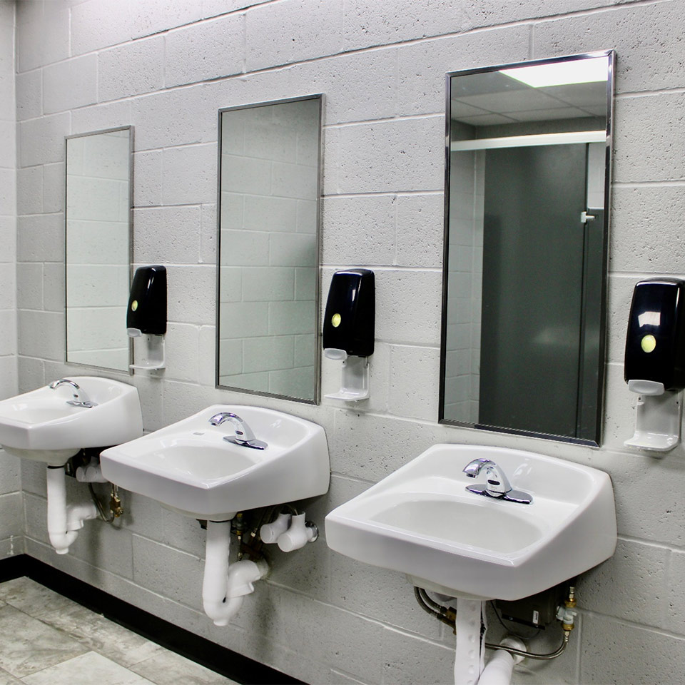 sinks and mirrors in a bathroom